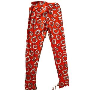 LuLaRoe Youth One Size Leggings Halloween Fangs Teeth Print Orange Novelty Pants